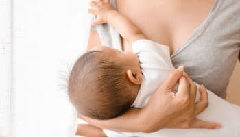 Woman breastfeeding her child